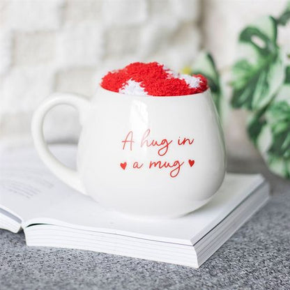 Hug in a Mug gift set with heart-patterned socks and 500ml mug