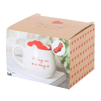 Hug in a Mug gift set with heart-patterned socks and 500ml mug