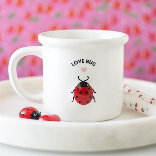 Love Bug Ceramic Mug with 3D ladybird design and 'love bug' theme, perfect for hot drinks.