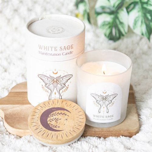 Luna Moth manifestation candle with white sage scent, clear quartz crystals, and frosted glass design