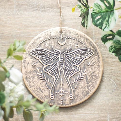 Metallic-effect terracotta plaque with Luna Moth and celestial details