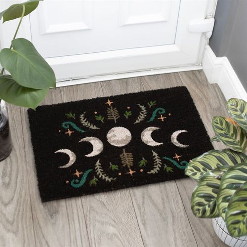 Mystical moon phase doormat accented by magical plants, perfect for a welcoming and enchanted entrance.