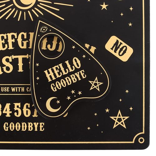 Placemat and coaster set with celestial black and gold talking board design, perfect for an alternative tablescape.