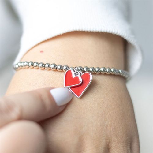 Red enamel heart bracelet, a sweet reminder of love, perfect for Valentine's Day, Mother's Day, or thoughtful gifts.