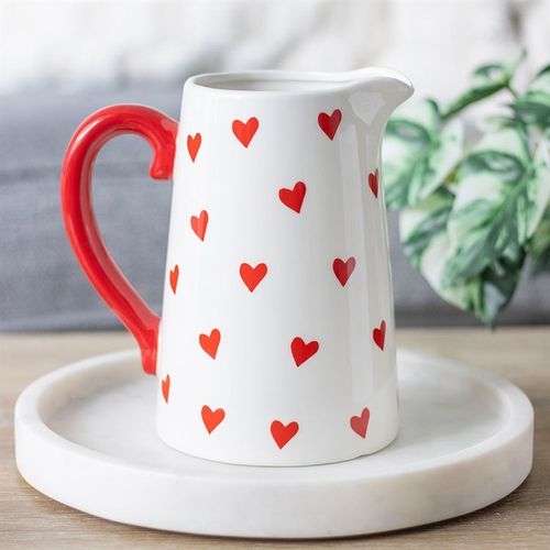 Valentine’s Day white flower jug with heart print and red handle