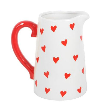 Valentine’s Day white flower jug with heart print and red handle