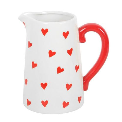 Valentine’s Day white flower jug with heart print and red handle