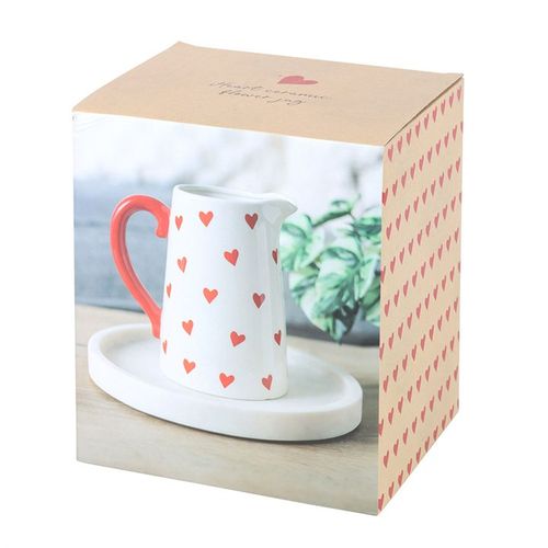 Valentine’s Day white flower jug with heart print and red handle