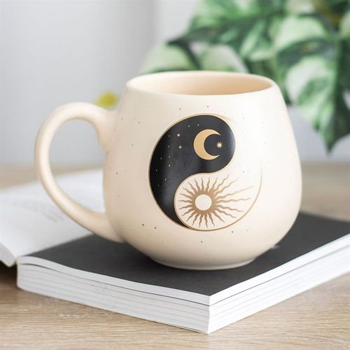 Yin and Yang Mug with sun and moon design, symbolising balance and harmony.