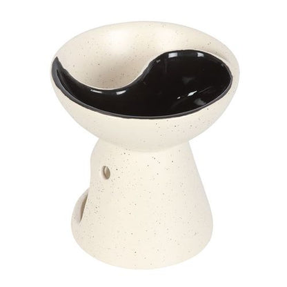 Yin and Yang oil burner and wax warmer with split dish for mixing scents.